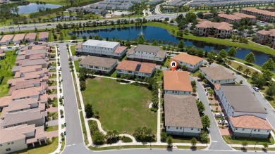 Stunning Move-In Ready Townhome in the Prestigious Gated on Eagle Creek Golf Club in Florida - for sale on GolfHomes.com, golf home, golf lot