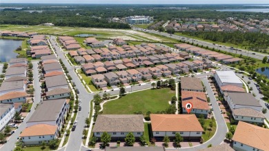 Stunning Move-In Ready Townhome in the Prestigious Gated on Eagle Creek Golf Club in Florida - for sale on GolfHomes.com, golf home, golf lot