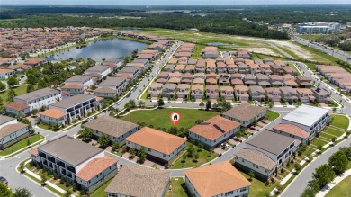 Stunning Move-In Ready Townhome in the Prestigious Gated on Eagle Creek Golf Club in Florida - for sale on GolfHomes.com, golf home, golf lot