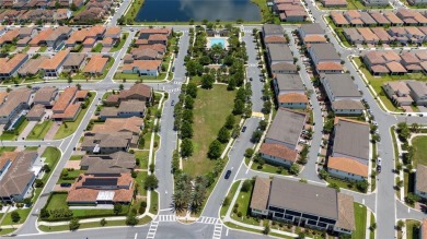 Stunning Move-In Ready Townhome in the Prestigious Gated on Eagle Creek Golf Club in Florida - for sale on GolfHomes.com, golf home, golf lot