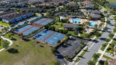 Stunning Move-In Ready Townhome in the Prestigious Gated on Eagle Creek Golf Club in Florida - for sale on GolfHomes.com, golf home, golf lot