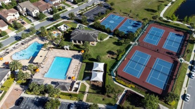 Stunning Move-In Ready Townhome in the Prestigious Gated on Eagle Creek Golf Club in Florida - for sale on GolfHomes.com, golf home, golf lot