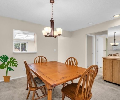 This spacious end-unit villa with serene golf course views is on Highland Lakes Executive Golf Course in Florida - for sale on GolfHomes.com, golf home, golf lot