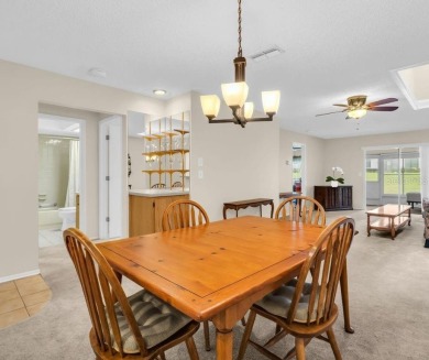 This spacious end-unit villa with serene golf course views is on Highland Lakes Executive Golf Course in Florida - for sale on GolfHomes.com, golf home, golf lot