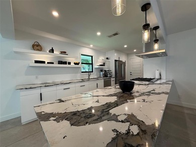 This remarkable home, expertly remodeled in 2023 by its skilled on The Northwood Club in Texas - for sale on GolfHomes.com, golf home, golf lot