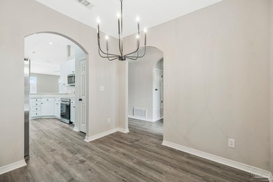 Beautifully updated brick home in desirable Oak Pointe! This on Tiger Point Golf and Country Club in Florida - for sale on GolfHomes.com, golf home, golf lot