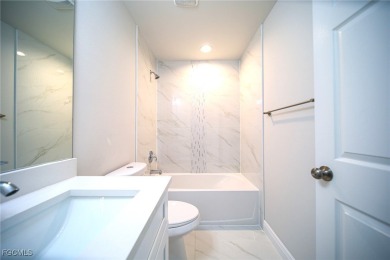BRAND NEW CONSTRUCTION! You Will Be Amazed By The Quality Of on Mirror Lakes Golf Club in Florida - for sale on GolfHomes.com, golf home, golf lot