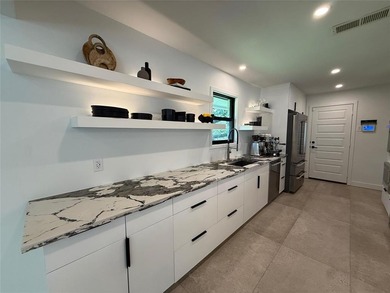 This remarkable home, expertly remodeled in 2023 by its skilled on The Northwood Club in Texas - for sale on GolfHomes.com, golf home, golf lot