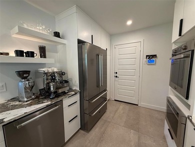 This remarkable home, expertly remodeled in 2023 by its skilled on The Northwood Club in Texas - for sale on GolfHomes.com, golf home, golf lot