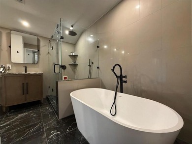 This remarkable home, expertly remodeled in 2023 by its skilled on The Northwood Club in Texas - for sale on GolfHomes.com, golf home, golf lot