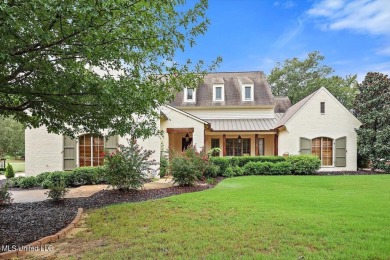 Amazing home on the 3rd fairway at Reunion. Spacious living room on Reunion Golf Club in Mississippi - for sale on GolfHomes.com, golf home, golf lot