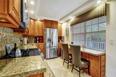 Discover resort-style living in this beautifully updated on Palm-Aire Country Club and Resort - The Oaks in Florida - for sale on GolfHomes.com, golf home, golf lot