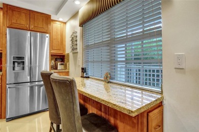 Discover resort-style living in this beautifully updated on Palm-Aire Country Club and Resort - The Oaks in Florida - for sale on GolfHomes.com, golf home, golf lot