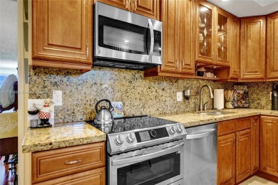 Discover resort-style living in this beautifully updated on Palm-Aire Country Club and Resort - The Oaks in Florida - for sale on GolfHomes.com, golf home, golf lot