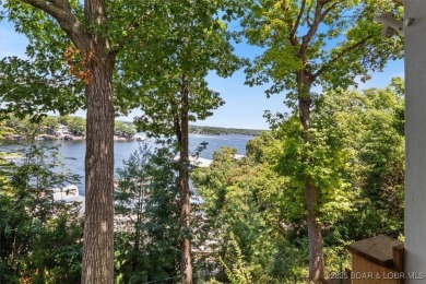 Charming Remodeled Condo with Sweeping Main Channel Views - Just on Seasons Ridge At Four Seasons in Missouri - for sale on GolfHomes.com, golf home, golf lot