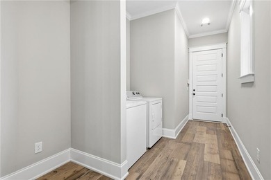 Enjoy resort-style living in National Village at the Robert on Grand National Golf Course in Alabama - for sale on GolfHomes.com, golf home, golf lot