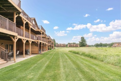 Turn-key 2nd floor condo overlooking hole 2 at Northern Bay Golf on Northern Bay Golf Resort and Marina in Wisconsin - for sale on GolfHomes.com, golf home, golf lot