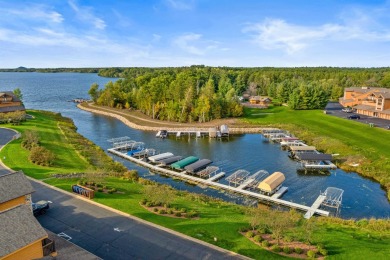 Turn-key 2nd floor condo overlooking hole 2 at Northern Bay Golf on Northern Bay Golf Resort and Marina in Wisconsin - for sale on GolfHomes.com, golf home, golf lot