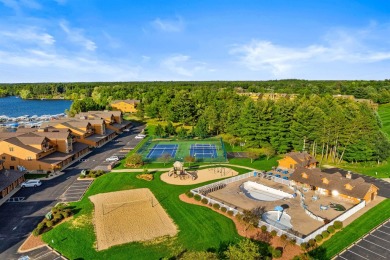 Turn-key 2nd floor condo overlooking hole 2 at Northern Bay Golf on Northern Bay Golf Resort and Marina in Wisconsin - for sale on GolfHomes.com, golf home, golf lot