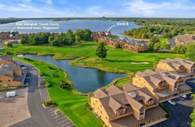 Turn-key 2nd floor condo overlooking hole 2 at Northern Bay Golf on Northern Bay Golf Resort and Marina in Wisconsin - for sale on GolfHomes.com, golf home, golf lot