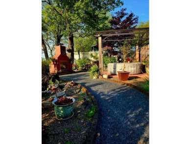 Perched on a hilltop overlooking a breathtaking scenic view of on Port Jervis Country Club in New York - for sale on GolfHomes.com, golf home, golf lot