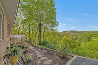 Perched on a hilltop overlooking a breathtaking scenic view of on Port Jervis Country Club in New York - for sale on GolfHomes.com, golf home, golf lot