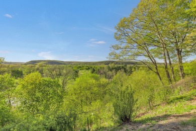 Perched on a hilltop overlooking a breathtaking scenic view of on Port Jervis Country Club in New York - for sale on GolfHomes.com, golf home, golf lot