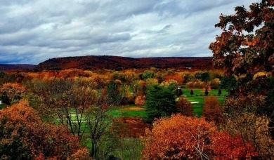 Perched on a hilltop overlooking a breathtaking scenic view of on Port Jervis Country Club in New York - for sale on GolfHomes.com, golf home, golf lot