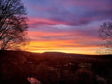 Perched on a hilltop overlooking a breathtaking scenic view of on Port Jervis Country Club in New York - for sale on GolfHomes.com, golf home, golf lot