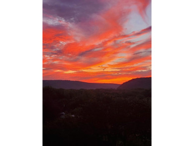 Perched on a hilltop overlooking a breathtaking scenic view of on Port Jervis Country Club in New York - for sale on GolfHomes.com, golf home, golf lot