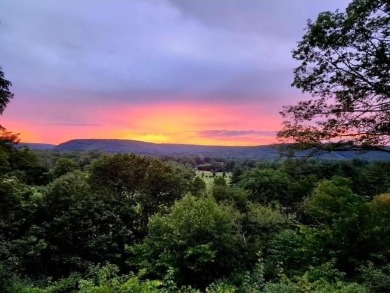 Perched on a hilltop overlooking a breathtaking scenic view of on Port Jervis Country Club in New York - for sale on GolfHomes.com, golf home, golf lot
