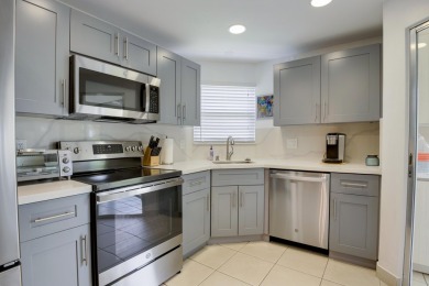 STOP SEARCHING! YOU FOUND THIS SPARKLING UPDATED CORNER CONDO on Poinciana Golf Club in Florida - for sale on GolfHomes.com, golf home, golf lot