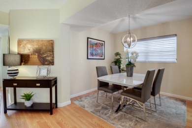 STOP SEARCHING! YOU FOUND THIS SPARKLING UPDATED CORNER CONDO on Poinciana Golf Club in Florida - for sale on GolfHomes.com, golf home, golf lot