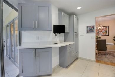STOP SEARCHING! YOU FOUND THIS SPARKLING UPDATED CORNER CONDO on Poinciana Golf Club in Florida - for sale on GolfHomes.com, golf home, golf lot