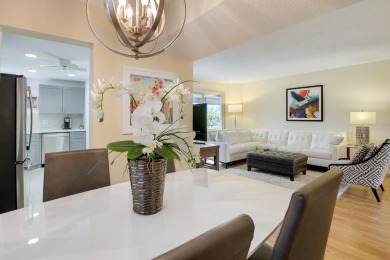 STOP SEARCHING! YOU FOUND THIS SPARKLING UPDATED CORNER CONDO on Poinciana Golf Club in Florida - for sale on GolfHomes.com, golf home, golf lot