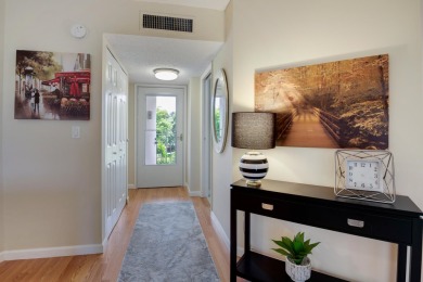 STOP SEARCHING! YOU FOUND THIS SPARKLING UPDATED CORNER CONDO on Poinciana Golf Club in Florida - for sale on GolfHomes.com, golf home, golf lot