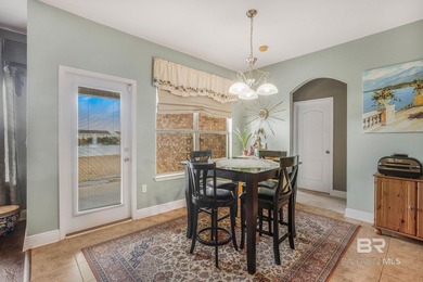 Welcome to this spacious 5 bedroom, 3 bathroom water front home on Craft Farms - Cypress Bend in Alabama - for sale on GolfHomes.com, golf home, golf lot