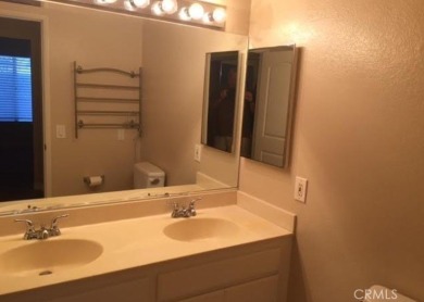 This quiet and serene condominium development is located just on Tijeras Creek Golf Club in California - for sale on GolfHomes.com, golf home, golf lot