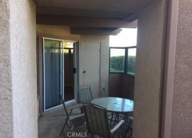 This quiet and serene condominium development is located just on Tijeras Creek Golf Club in California - for sale on GolfHomes.com, golf home, golf lot