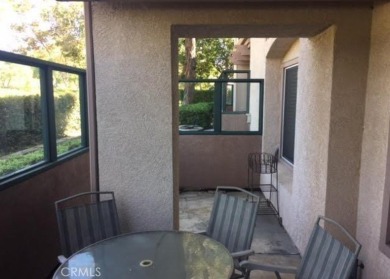 This quiet and serene condominium development is located just on Tijeras Creek Golf Club in California - for sale on GolfHomes.com, golf home, golf lot