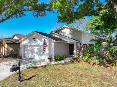 Welcome to your serene waterfront retreat in the highly on Tuscawilla Country Club in Florida - for sale on GolfHomes.com, golf home, golf lot