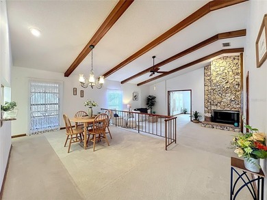 Welcome to your serene waterfront retreat in the highly on Tuscawilla Country Club in Florida - for sale on GolfHomes.com, golf home, golf lot