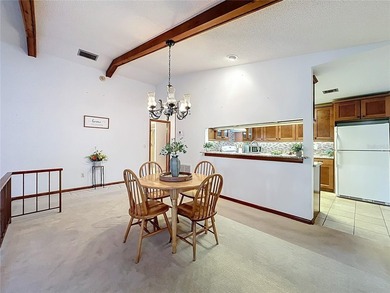 Welcome to your serene waterfront retreat in the highly on Tuscawilla Country Club in Florida - for sale on GolfHomes.com, golf home, golf lot