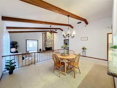 Welcome to your serene waterfront retreat in the highly on Tuscawilla Country Club in Florida - for sale on GolfHomes.com, golf home, golf lot