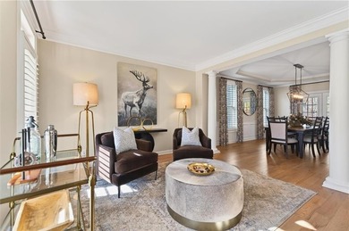 Welcome home to timeless style perfectly positioned on a private on Woodmont Golf and Country Club in Georgia - for sale on GolfHomes.com, golf home, golf lot