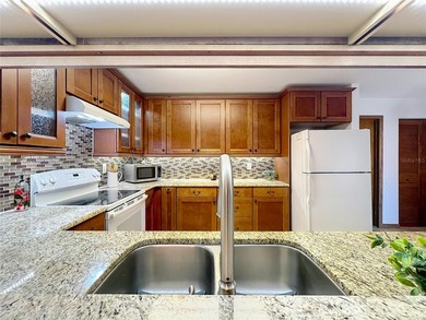 Welcome to your serene waterfront retreat in the highly on Tuscawilla Country Club in Florida - for sale on GolfHomes.com, golf home, golf lot