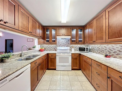 Welcome to your serene waterfront retreat in the highly on Tuscawilla Country Club in Florida - for sale on GolfHomes.com, golf home, golf lot