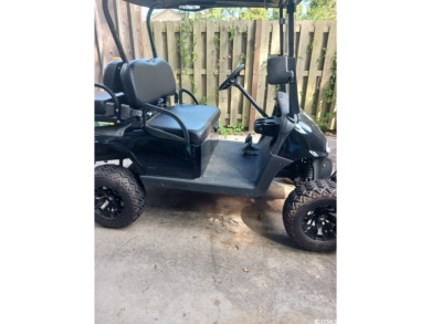 END UNIT , GOLF CART STORAGE, AND WALKING DISTANCE TO THE OCEAN on The Dunes Golf and Beach Club in South Carolina - for sale on GolfHomes.com, golf home, golf lot