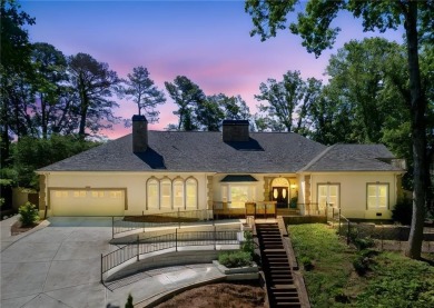 Tucked in Atlanta Country Club's quiet interior, this European on Atlanta Country Club in Georgia - for sale on GolfHomes.com, golf home, golf lot