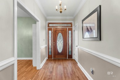 This classic Southern house sits on a corner lot in the heart of on Lake Forest Yacht and Country Club in Alabama - for sale on GolfHomes.com, golf home, golf lot